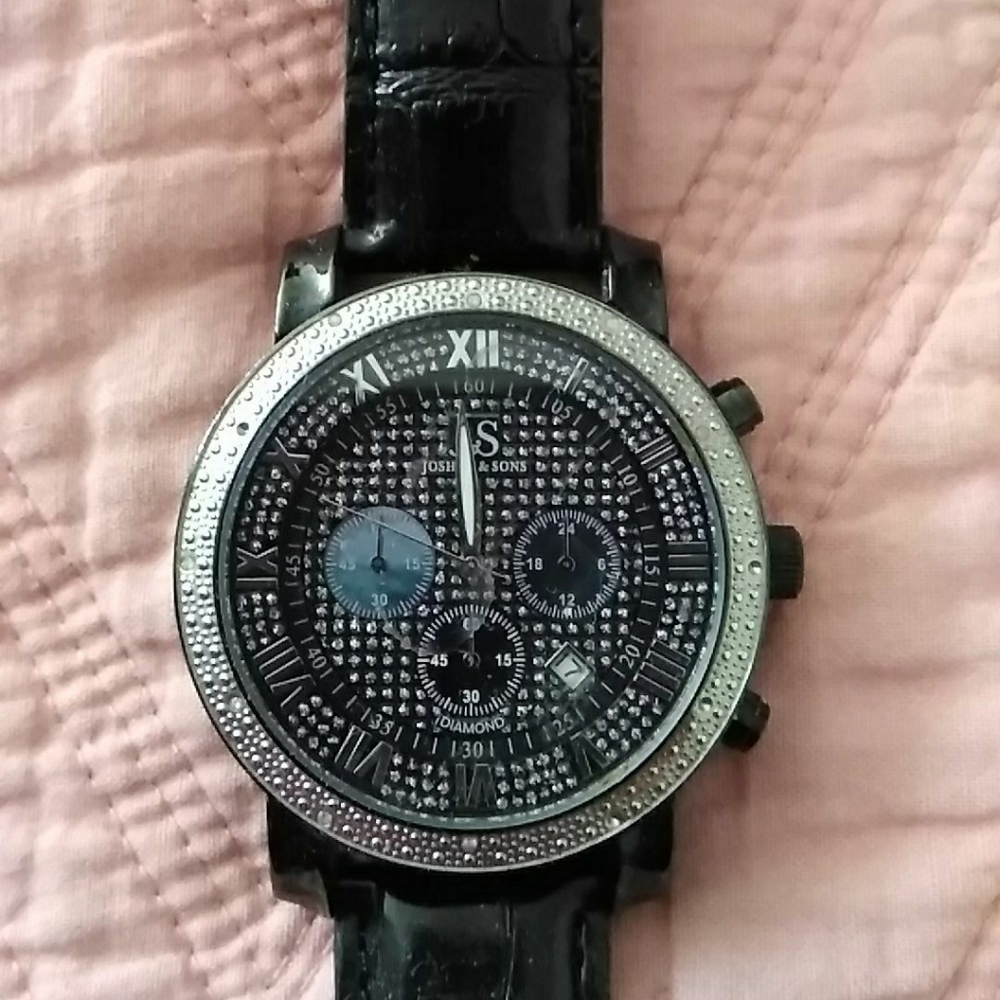 Joshua & son's diamond watch